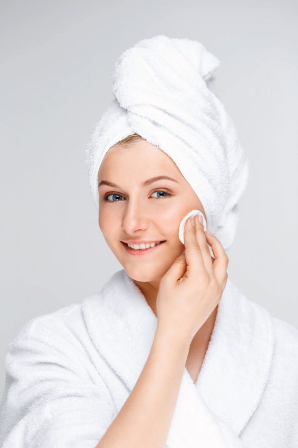 Skincare serums and creams arranged on a neutral background