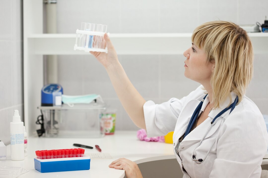 Formulation chemist examining a test tube in the lab
